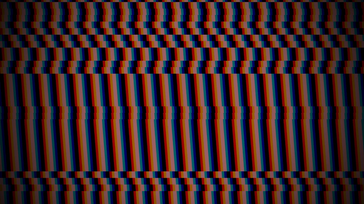 The glitch scene — dense bands of red and blue stripes torn sideways